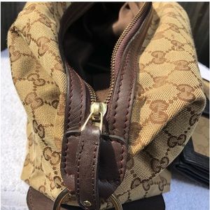 Gucci purse and matching wallet set no strap Gucci unisex gently used like new